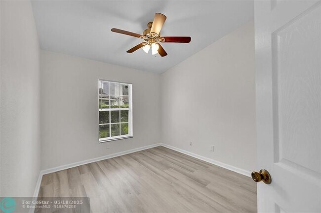 Building Photo - 5642 NW 118th Dr