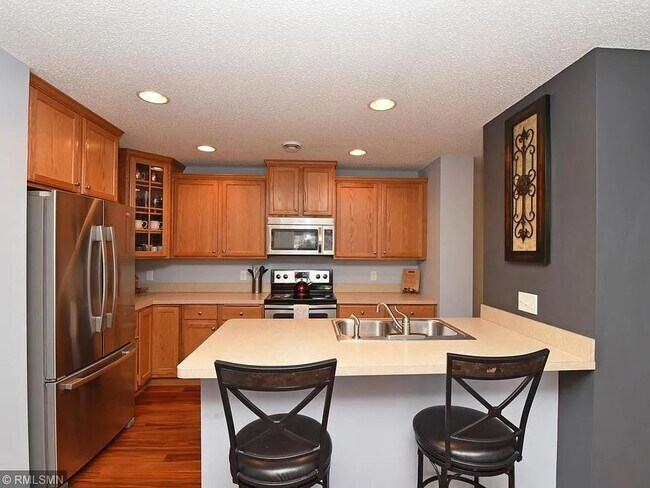 Building Photo - 3 Bedrooms | Loft | Upper-Level Laundry | 3-Sided Fireplace | Woodbury