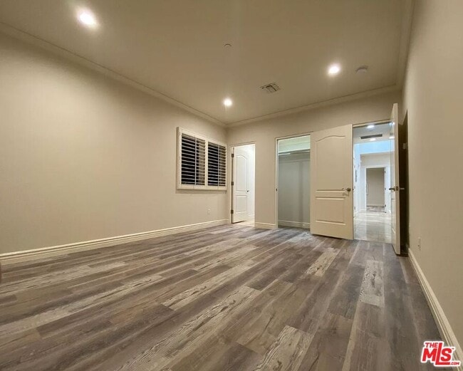 Building Photo - 349 S La Peer Dr