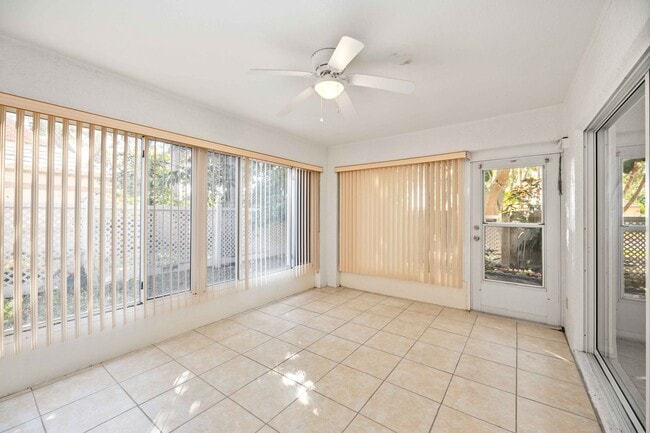 Building Photo - Beautiful Must See!! 3/2 Plus Sunroom & Garage!!  Gated Community!!