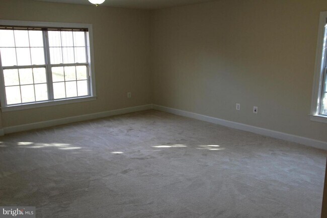Building Photo - Discover this beautifully updated end unit townhome offering a perfect blend of style, comfort, a...