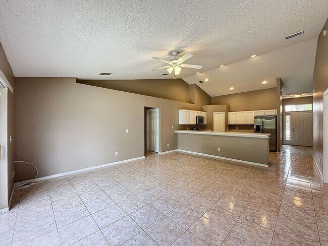Building Photo - Poinciana single family home in Village 7,...