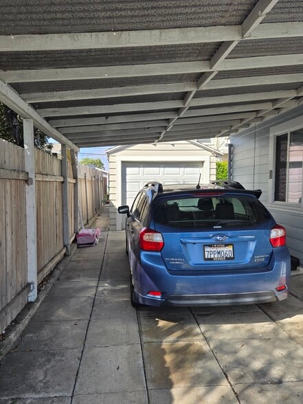 Car Port with Roof & Garage in background - 4634 Cherokee Ave