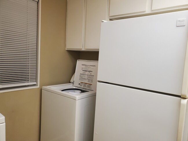 Washer in the unit. - 7122 Wood Hollow Dr