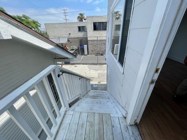 Building Photo - 2-BR Upstairs Unit with Garage in Heart of...