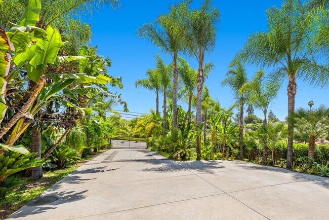 Building Photo - Beautiful Custom Built, Two-Story Home on Stunningly Landscaped Property with Gated Entrance!