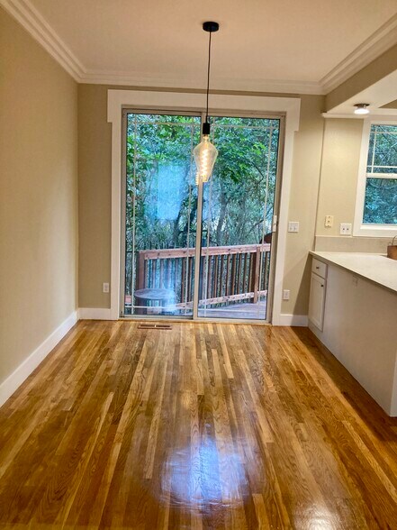 Dining area with view out the deck - 3954 Canon Ave