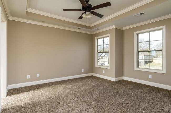 Building Photo - Pet Friendly Three Bedroom with Bonus!
