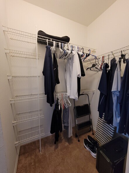 Walk in closet in primary suite - 2627 Maitland Crossing Way