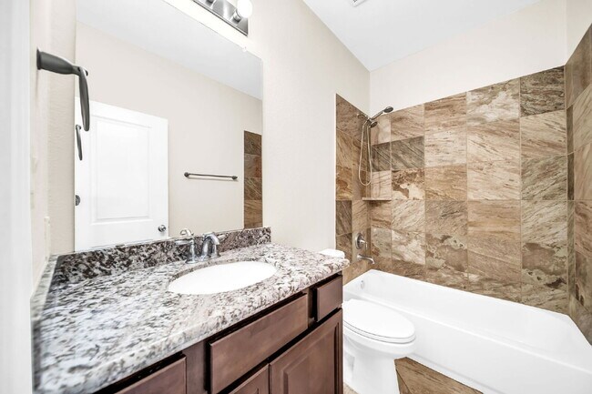 Building Photo - Welcome to this well-kept, single-story gem located in the Villas of Mia Lago!