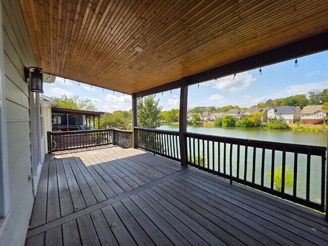 Building Photo - Lakefront 3BR/3BA with Water Views, Garage & Covered Deck