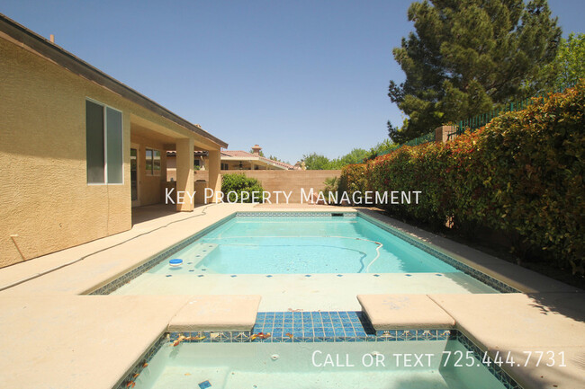 Building Photo - HIGHLY UPGRADED HOME W/ POOL IN GATED COMM...