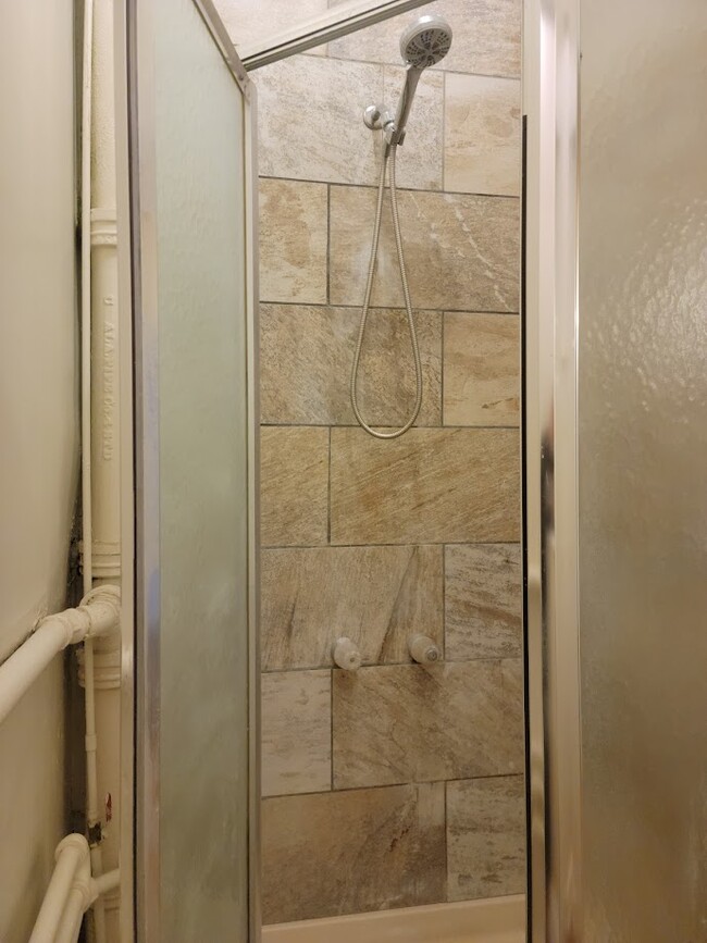 Tiled Shower and Toilet area - 605 Lincolnway