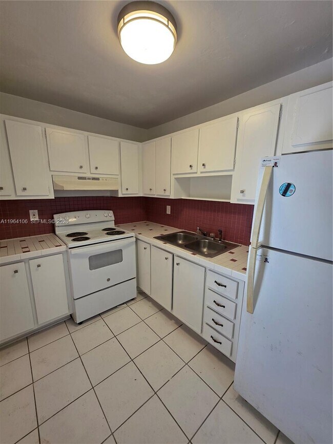 Building Photo - 4731 NW 10th Ct