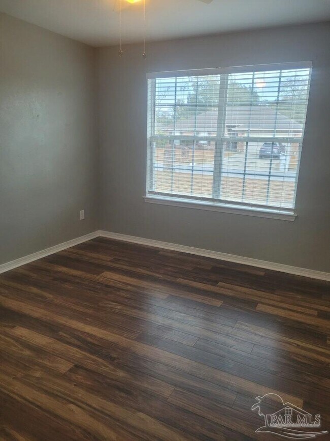 Building Photo - 5863 Chi Chi Cir