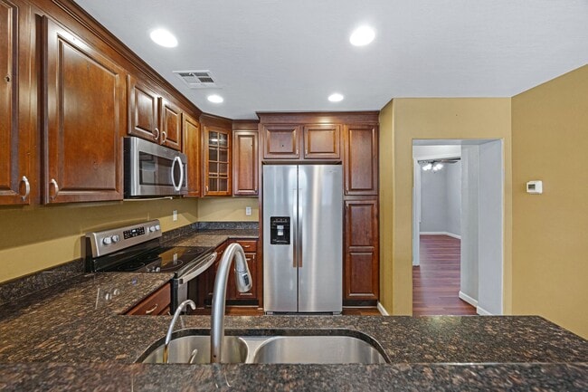 Building Photo - Modern Tri-Level Townhome in Copper Leaf C...