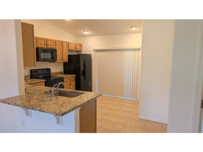 Building Photo - Updated Spacious Rental Available in Palm Coast, FL