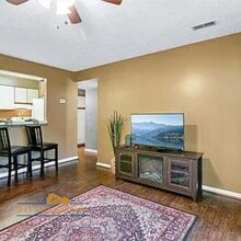 Building Photo - Modern First-Floor with Private Patio in Hampton Club