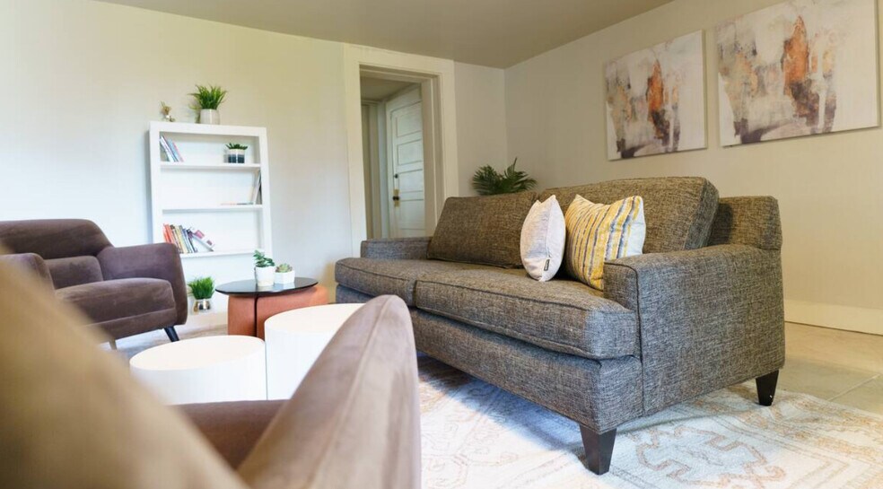 Staged living room - partially furnished available - 1411 College St