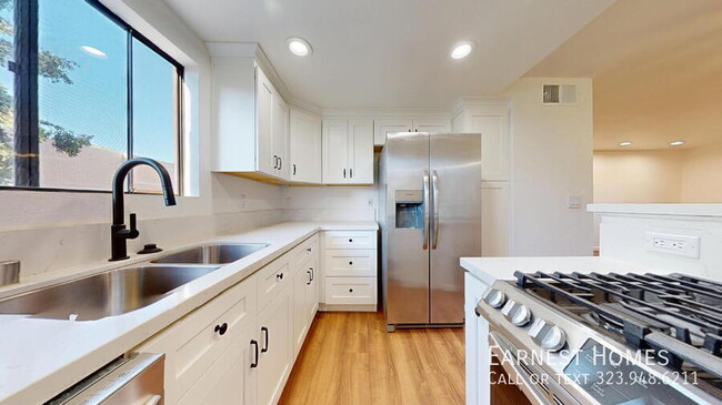 Building Photo - 10220 De Soto Ave