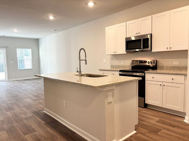 Building Photo - ABSOLUTELY BEAUTIFUL BRAND-NEW BUILD TOWNHOME