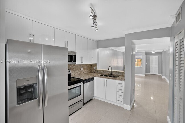 Building Photo - 7085 NW 173rd Dr