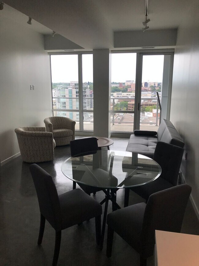 Building Photo - AVAILABLE SPRING 2027 - Downtown Iowa City High-Rise Condo with Amazing Views
