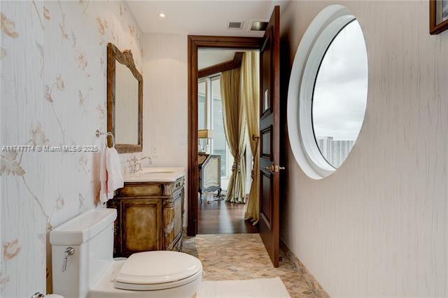 Building Photo - 16047 Collins Ave