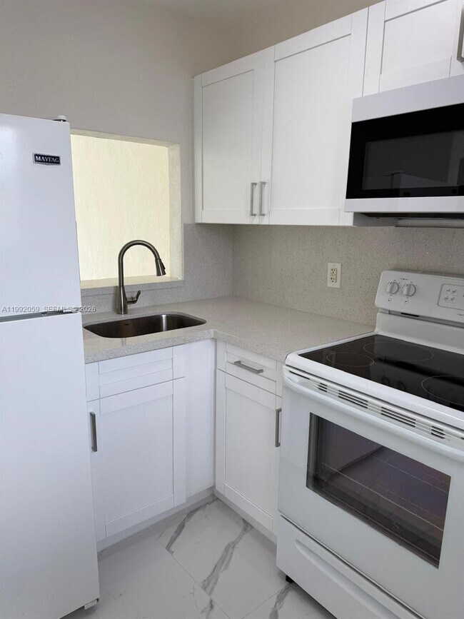 Building Photo - 4298 NW S Tamiami Canal Dr