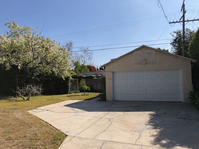 Backyard, including ample parking for cars side-by-side. - 10516 Blythe Ave
