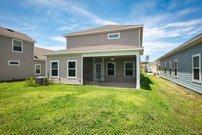 Building Photo - Spacious 4-Bedroom Home with Screened Pati...