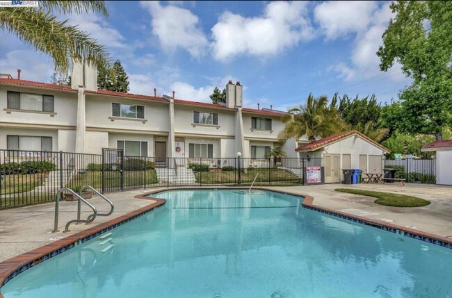 Building Photo - Charming Two-Story Condo with Modern Touch...