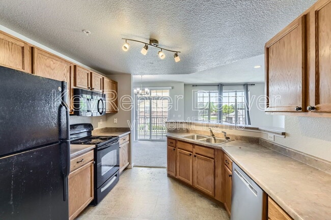 Building Photo - 5735 N Genoa Way