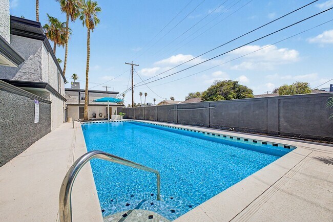 Building Photo - Spacious 2 Bed + Bonus Room | Large Private Yards | Covered Parking | 8 Weeks Free Rent!