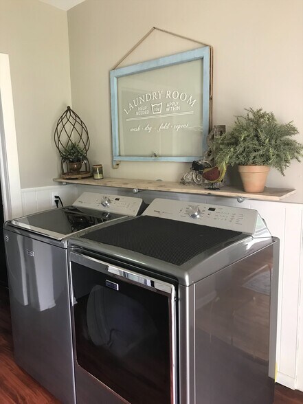 Main floor laundry - 7570 Fase St SE