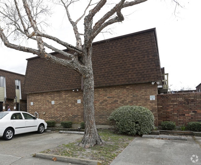 Primary Photo - Treetops Townhomes Condominiums