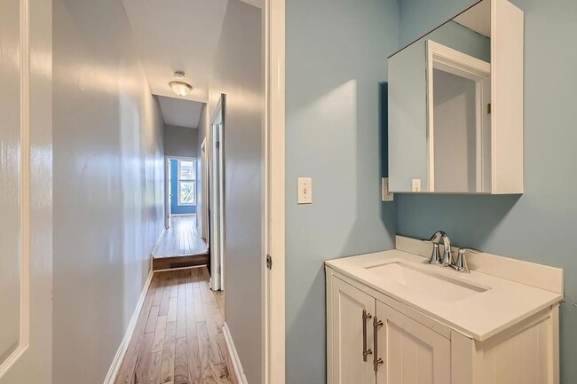 Building Photo - Charming 3 Bedroom/2.5 Bathroom Townhome in Patterson Park with Parking Pad!