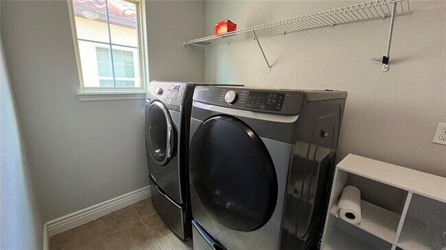 Building Photo - 6031 Roseate Spoonbill Dr