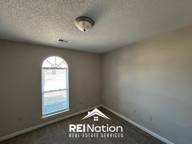 Building Photo - HORN LAKE STUNNER! 3BR/2BA | Vaulted Ceilings & Fireplace | Covered Patio & Garage!