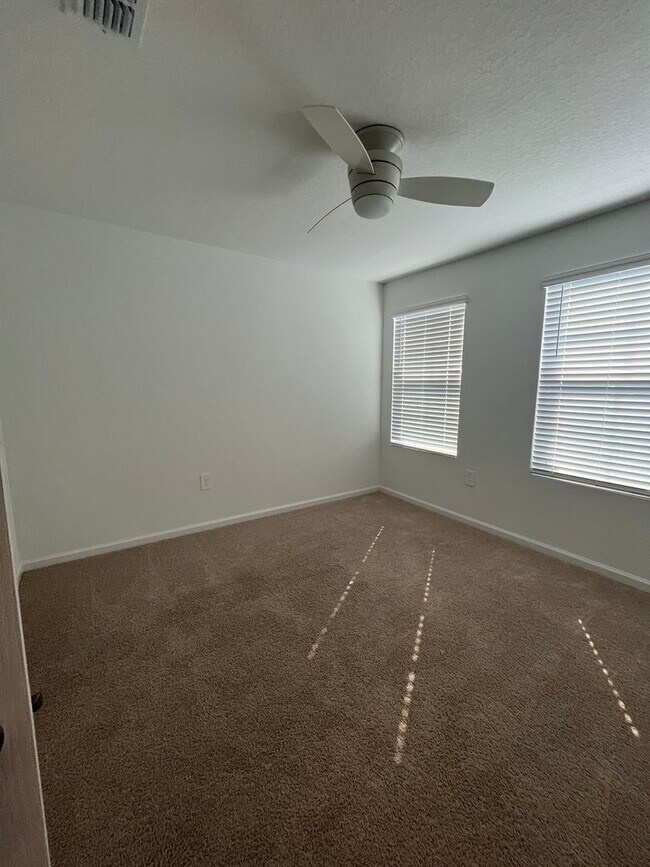 Building Photo - Town Home in The Trails -2 Primary Suites!!