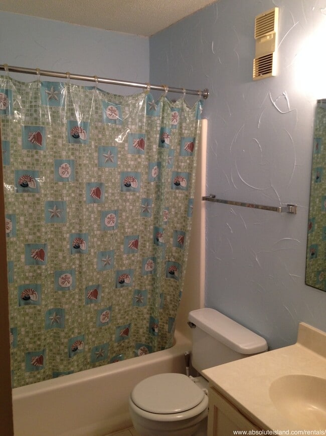 Building Photo - Beach Access, Bike Rides, Coastal Comfort.