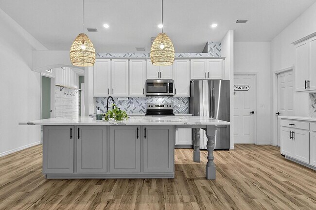 Building Photo - Modern 4-Bedroom, 3-Bath Home with Private In-Law Suite – Palm Coast, FL