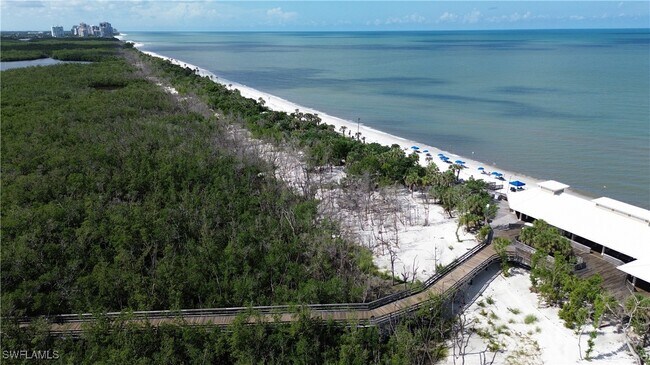 Building Photo - 7048 Pelican Bay Blvd