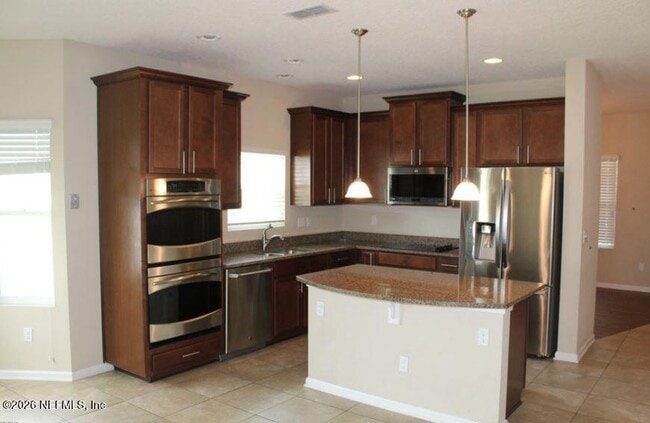 Building Photo - 16404 Magnolia Grove Way