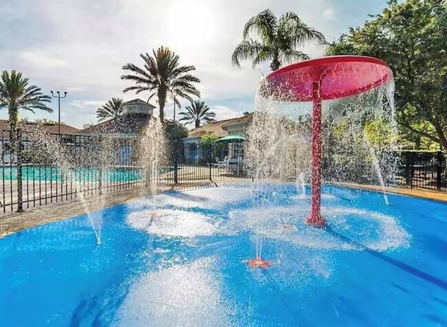 Building Photo - 8117 Princess Palm Ln