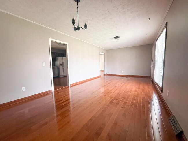 Building Photo - Spacious 3-Bedroom Home with Huge Yard, Covered Porches & Storage Building