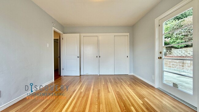 Building Photo - 4 Bedroom Mid-Century Oakmore Home With Views of Bay