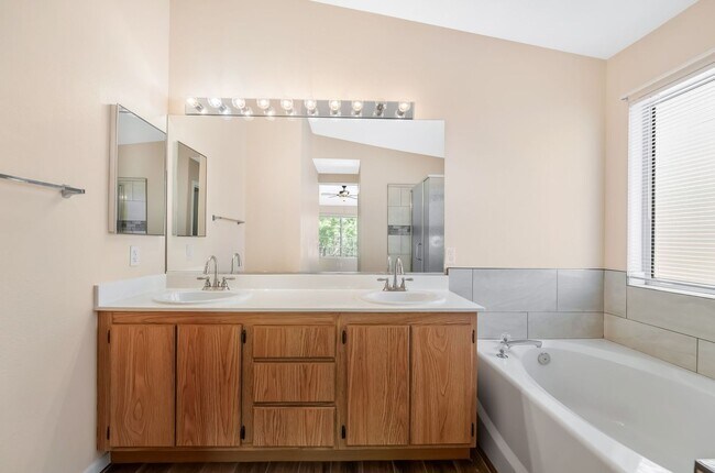 Building Photo - Gated Living with Community Pool & Thoughtfully Designed Open Layout!