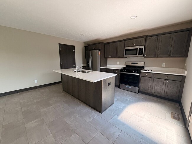 Building Photo - Spacious 4 Bedroom, 2.5 Bath in Caledonia!