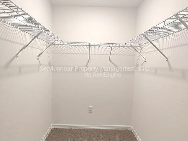 Building Photo - 7412 French Marigold Ave.